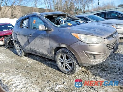 Czwarte zdjęcie samochodu z boku: 2010 HYUNDAI TUCSON GLS VIN:KM8JU3AC0AU018281 - miniatura