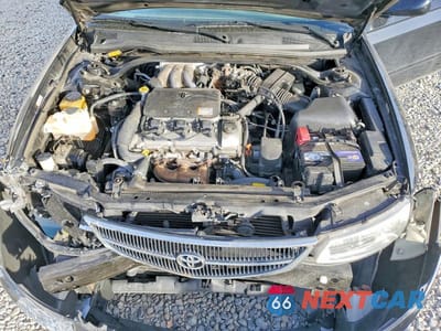Zdjęcie 11 z 12 samochodu: 2000 TOYOTA CAMRY SOLARA SE VIN:2T1FF28P1YC381090 - miniatura