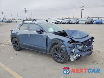 Czwarte zdjęcie samochodu z boku: 2023 MAZDA CX-30 PREFERRED VIN:3MVDMBCM5PM570808 - miniatura
