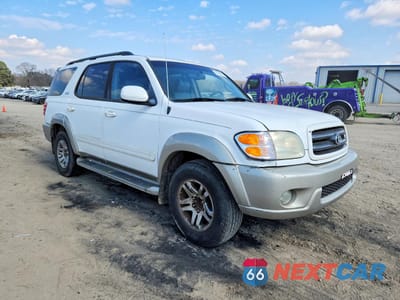 Czwarte zdjęcie samochodu z boku: 2004 TOYOTA SEQUOIA SR5 VIN:5TDZT34A04S232877 - miniatura