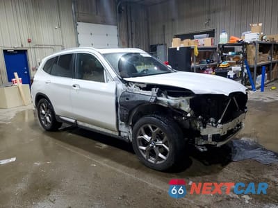 Czwarte zdjęcie samochodu z boku: 2022 BMW X3 XDRIVE30I VIN:5UX53DP05N9K59319 - miniatura