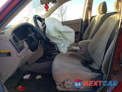 Zdjęcie 7 z 11 samochodu: 2002 HYUNDAI ELANTRA VIN:KMHDN45D12U440826 - miniatura