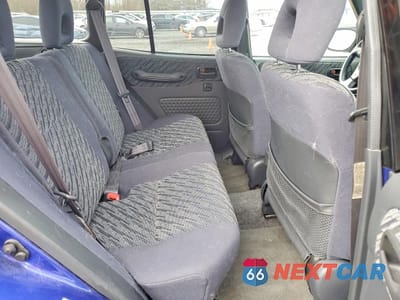 Zdjęcie 11 z 13 samochodu: 2000 TOYOTA RAV4 VIN:JT3GP10V5Y0044202 - miniatura