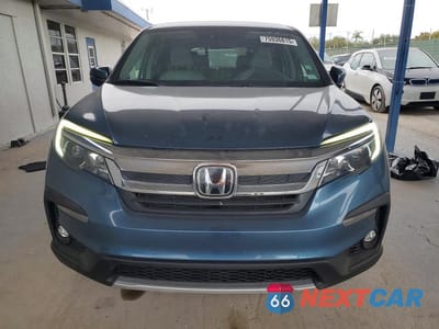 Piąte zdjęcie samochodu w środku: 2021 HONDA PILOT EX VIN:5FNYF5H32MB033036 - miniatura