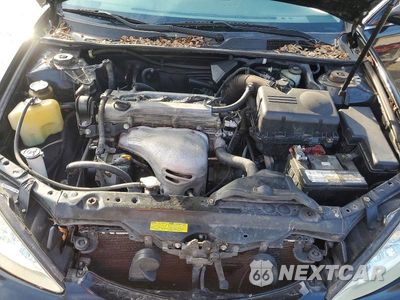 Zdjęcie 11 z 11 samochodu: 2004 TOYOTA CAMRY LE VIN:JTDBE32K140272444 - miniatura