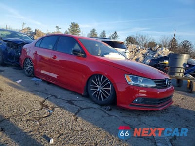 Czwarte zdjęcie samochodu z boku: 2015 VOLKSWAGEN JETTA SE VIN:3VWB17AJ6FM427613 - miniatura