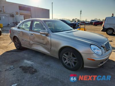 Czwarte zdjęcie samochodu z boku: 2003 MERCEDES-BENZ E 320 VIN:WDBUF65JX3A303644 - miniatura