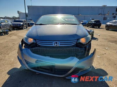 Piąte zdjęcie samochodu w środku: 2010 HONDA INSIGHT EX VIN:JHMZE2H70AS020548 - miniatura