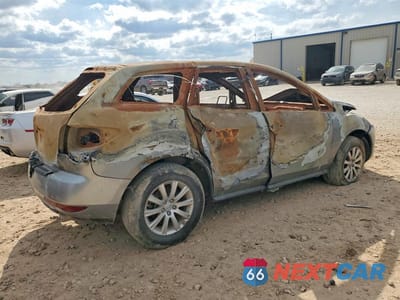 Trzecie zdjęcie samochodu z tyłu: 2010 MAZDA CX-7 VIN:JM3ER2W59A0316791 - miniatura