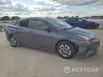 Czwarte zdjęcie samochodu z boku: 2016 TOYOTA PRIUS FOUR VIN:JTDKARFU6G3509281 - miniatura