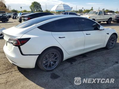 Trzecie zdjęcie samochodu z tyłu: 2021 TESLA MODEL 3 VIN:5YJ3E1EA2MF873214 - miniatura