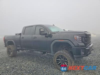 Czwarte zdjęcie samochodu z boku: 2020 GMC SIERRA K2500 DENALI VIN:1GT49REY7LF281127 - miniatura