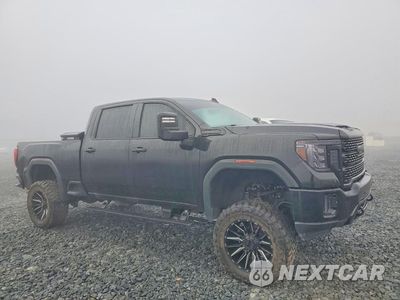 Czwarte zdjęcie samochodu z boku: 2020 GMC SIERRA K2500 DENALI VIN:1GT49REY7LF281127 - miniatura