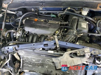 Zdjęcie 12 z 12 samochodu: 2004 HONDA CR-V LX VIN:JHLRD78414C053163 - miniatura