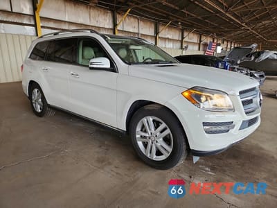 Czwarte zdjęcie samochodu z boku: 2015 MERCEDES-BENZ GL 350 BLUETEC VIN:4JGDF2EE3FA495244 - miniatura