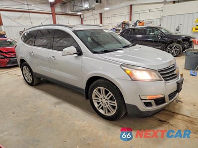 Czwarte zdjęcie samochodu z boku: 2014 CHEVROLET TRAVERSE LT VIN:1GNKRGKD0EJ209173 - miniatura