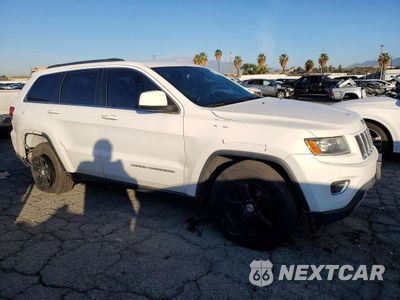 Czwarte zdjęcie samochodu z boku: 2016 JEEP GRAND CHEROKEE LAREDO VIN:1C4RJEAG4GC358949 - miniatura