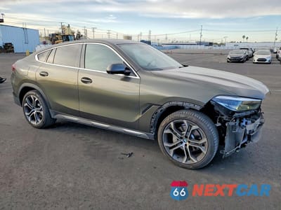 Czwarte zdjęcie samochodu z boku: 2020 BMW X6 SDRIVE 40I VIN:5UXCY4C05L9C39604 - miniatura