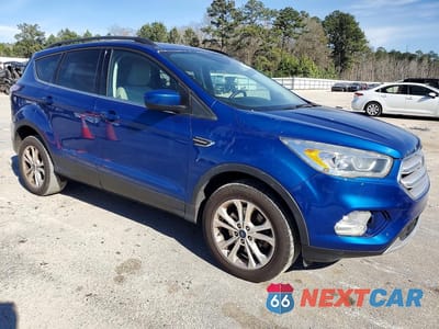 Czwarte zdjęcie samochodu z boku: 2018 FORD ESCAPE SEL VIN:1FMCU9HD6JUA57869 - miniatura