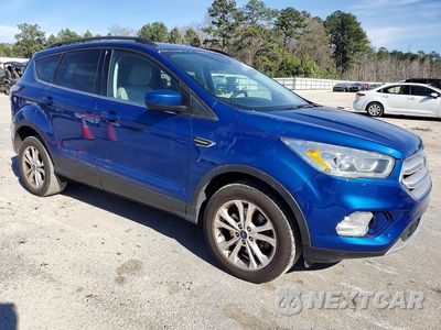 Czwarte zdjęcie samochodu z boku: 2018 FORD ESCAPE SEL VIN:1FMCU9HD6JUA57869 - miniatura