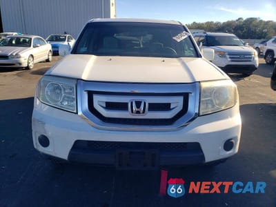 Piąte zdjęcie samochodu w środku: 2010 HONDA PILOT LX VIN:5FNYF4H2XAB003120 - miniatura