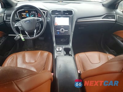 Zdjęcie 8 z 12 samochodu: 2019 FORD FUSION TITANIUM VIN:3FA6P0D92KR153180 - miniatura