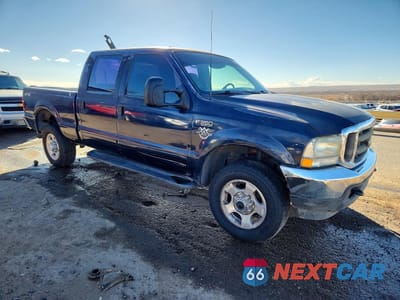 Czwarte zdjęcie samochodu z boku: 2002 FORD F350 SRW SUPER DUTY VIN:1FTSW31S92EB03545 - miniatura