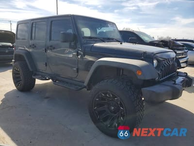 Czwarte zdjęcie samochodu z boku: 2016 JEEP WRANGLER UNLIMITED SPORT VIN:1C4BJWDG3GL206485 - miniatura