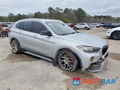 Czwarte zdjęcie samochodu z boku: 2018 BMW X1 SDRIVE28I VIN:WBXHU7C32J5H41847 - miniatura