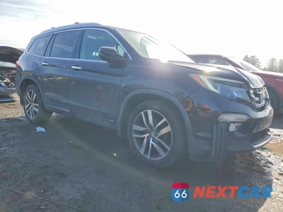 Czwarte zdjęcie samochodu z boku: 2017 HONDA PILOT ELITE VIN:5FNYF6H01HB013460 - miniatura