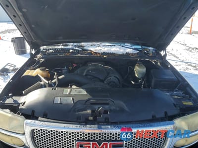 Zdjęcie 12 z 14 samochodu: 2004 GMC YUKON DENALI VIN:1GKEK63UX4J290303 - miniatura