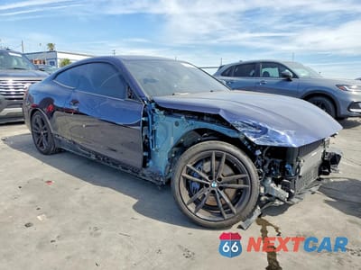 Czwarte zdjęcie samochodu z boku: 2021 BMW M440XI VIN:WBA13AR0XMCG30021 - miniatura