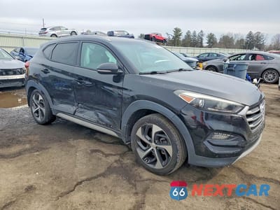 Czwarte zdjęcie samochodu z boku: 2017 HYUNDAI TUCSON SPORT VIN:KM8J3CA21HU592568 - miniatura