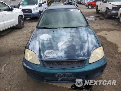 Piąte zdjęcie samochodu w środku: 1999 HONDA CIVIC LX VIN:JHMEJ6576XS000934 - miniatura