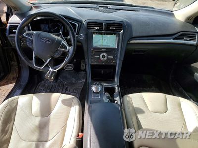 Zdjęcie 8 z 12 samochodu: 2017 FORD FUSION TITANIUM HEV VIN:3FA6P0RU3HR394512 - miniatura
