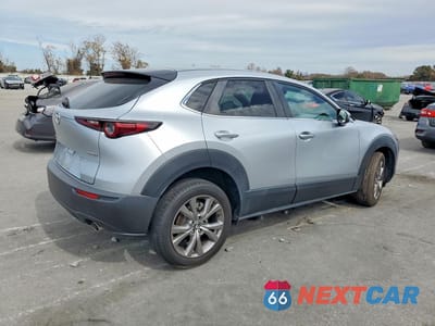 Trzecie zdjęcie samochodu z tyłu: 2021 MAZDA CX-30 PREFERRED VIN:3MVDMBCL3MM230978 - miniatura
