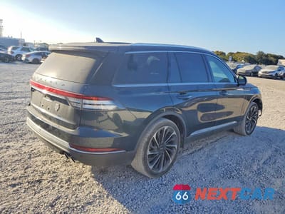 Trzecie zdjęcie samochodu z tyłu: 2021 LINCOLN AVIATOR RESERVE VIN:5LM5J7WC1MGL09107 - miniatura