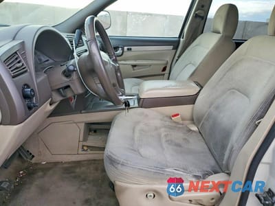 Zdjęcie 7 z 11 samochodu: 2004 BUICK RENDEZVOUS CX VIN:3G5DA03E94S520452 - miniatura