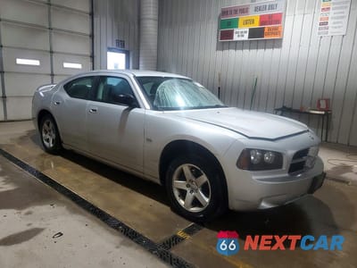 Czwarte zdjęcie samochodu z boku: 2009 DODGE CHARGER SXT VIN:2B3KA33V09H595893 - miniatura
