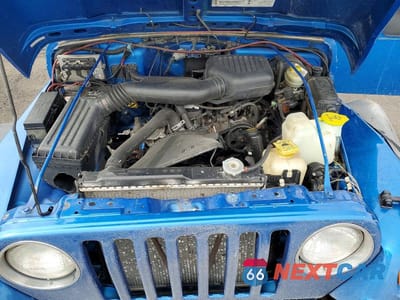 Zdjęcie 11 z 12 samochodu: 1999 JEEP WRANGLER / TJ SE VIN:1J4FY29P2XP481430 - miniatura