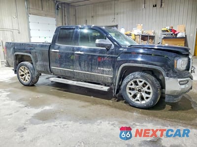 Czwarte zdjęcie samochodu z boku: 2017 GMC SIERRA K1500 SLT VIN:1GTV2NEC4HZ386753 - miniatura