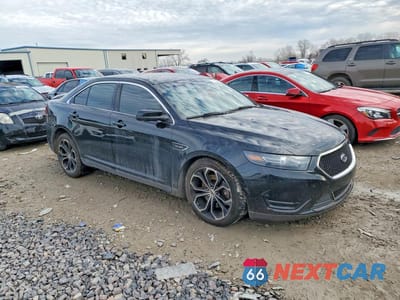 Czwarte zdjęcie samochodu z boku: 2015 FORD TAURUS SHO VIN:1FAHP2KT1FG190026 - miniatura