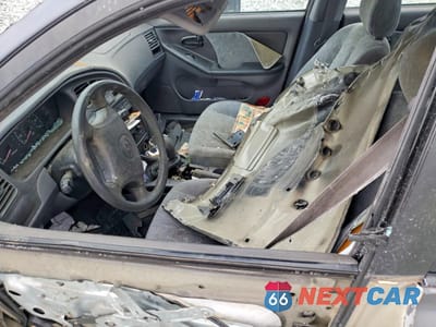 Zdjęcie 7 z 13 samochodu: 2002 HYUNDAI ELANTRA GLS VIN:KMHDN45D12U351559 - miniatura