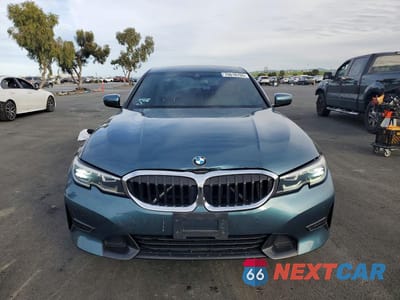 Piąte zdjęcie samochodu w środku: 2021 BMW 330I VIN:3MW5R1J09M8B76442 - miniatura