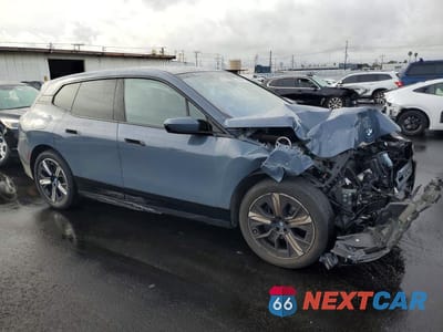 Czwarte zdjęcie samochodu z boku: 2024 BMW IX XDRIVE50 VIN:WB523CF07RCN47833 - miniatura