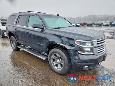 Czwarte zdjęcie samochodu z boku: 2016 CHEVROLET TAHOE K1500 LT VIN:1GNSKBKC3GR165575 - miniatura