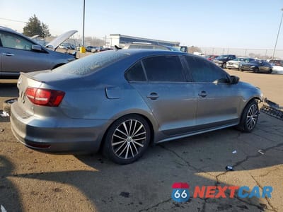 Trzecie zdjęcie samochodu z tyłu: 2016 VOLKSWAGEN JETTA SPORT VIN:3VWD17AJ3GM259410 - miniatura