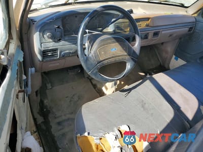 Zdjęcie 8 z 13 samochodu: 1992 FORD F350 DUMP TRUCK VIN:2FDJF37G6NCA17940 - miniatura