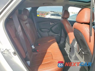 Zdjęcie 11 z 13 samochodu: 2013 HYUNDAI TUCSON VIN:KM8JUCAC4DU663570 - miniatura