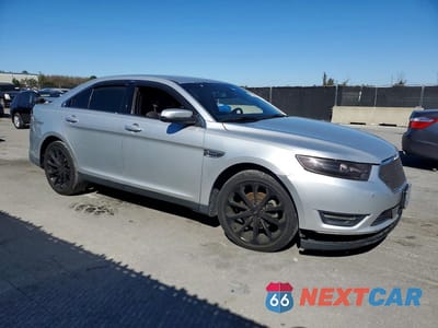 Czwarte zdjęcie samochodu z boku: 2014 FORD TAURUS SEL VIN:1FAHP2E85EG181710 - miniatura